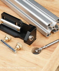 Aluminum Profile Tapping Assistant Tap Guide Jig For 20 30 40 Series European Standard Extrusion Helps You Center Holes And Tap Straight For DIY Furniture Pro Grade 3D Printers Lab Equipment And Industrial Projects, shown with jig, aluminum profile, and drill bit on wooden surface