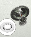 30 Pcs Stainless Steel Fire Sprinkler Cover Plates With Slick Silver Dual Disc Design installation on ceiling with sprinkler head visible.