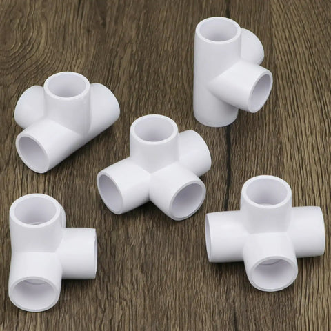 Four Way PVC Fittings Half Inch Eight Pack Furniture Grade Pipe Connectors Elbow PVC Corner Fittings With Deep Sleeves For A Sturdy Do It Yourself Setup displayed on wooden surface
