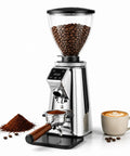 Slick Flat Burr Coffee Grinder Featuring Stainless Steel Blades And An Adjustable Portafilter For Espresso One Touch Automatic Operation Large 750 Gram Hopper Makes Grinding Easy Peasy For Daily Home Use with coffee beans and cup.
