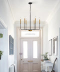 Modern Farmhouse Black And Gold 6 Light Candle Chandelier With Adjustable Height Chain And Rods Ceiling Light Fixture in hallway