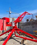 Heavy-Duty Concrete Placement Machine With Hydraulic Boom System For Warehouse Floors, Bridge Decks, Residential Foundations, Industrial Sites And Structural Projects Built For Quick, Smooth Pours. Red hydraulic boom at construction site