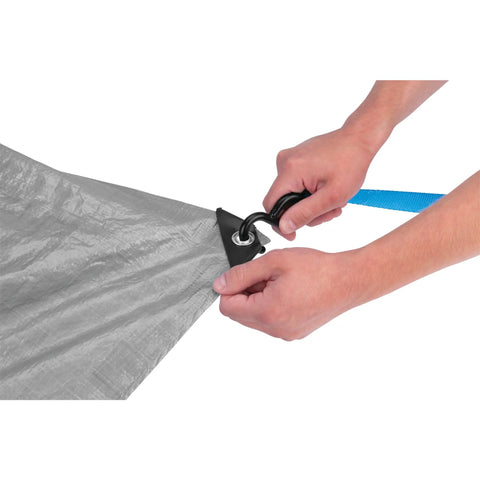 Hands securing Heavy Duty Camping Tarp 8x10 Feet Weatherproof Shelter For Outdoors to hook with grommet