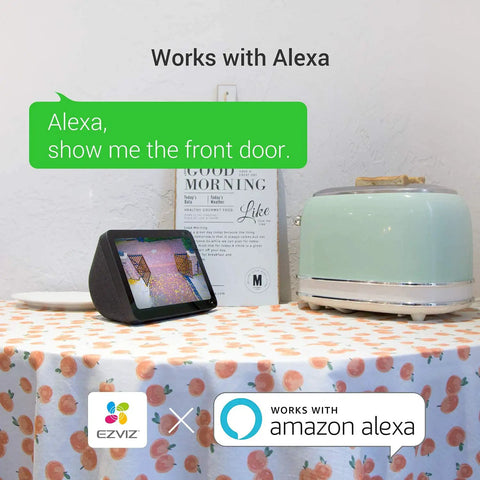 Smart display connecting 2K Outdoor Security Camera For Home, showing front door feed, Alexa command text visible.
