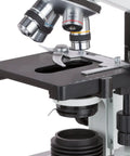Rock Solid Pro Grade Digital Compound Microscope With 5MP USB Camera And 40X To 2000X Magnification close-up of objectives and stage.