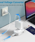 Travel Voltage Converter 220V To 110V With 4 USB Ports And Universal Plug Adapter For Hair Straighteners, shown with laptop and passport