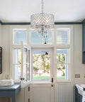 Modern Crystal Pendant Light With Drum Shade In Chrome 4 Light Chandelier For Bedroom Kitchen Island Dining Room Hanging Ceiling Fixture Featuring Glass Crystal Drops For A Lux Minimal Look in kitchen setting