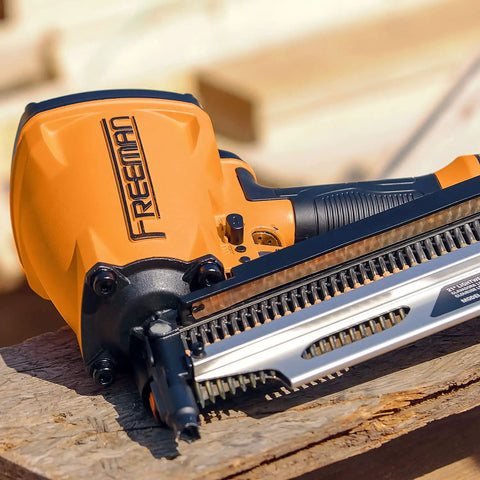 Second Generation Compact Lightweight Pneumatic Framing Nailer With 21 Degree Magazine on wood, close-up view, magnesium body