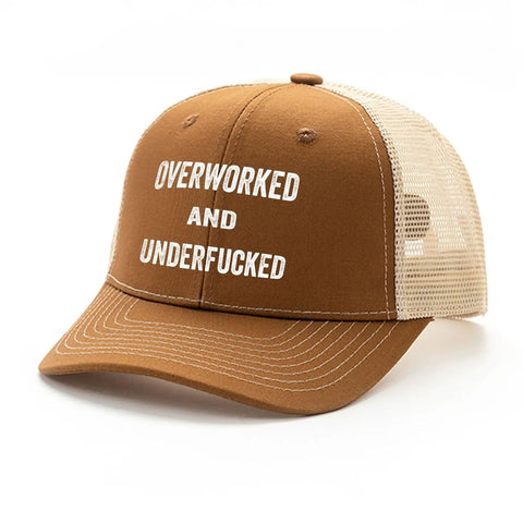 Brown Low Profile Distressed Trucker Cap For Women with bold white text, beige mesh back, lightweight washed cotton baseball hat.