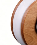 Heavy Duty Casters 4 Pieces M8 Threaded Heavy Duty Silent Replacements close-up view of caster wheel, showing wood detail and design.