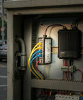 Installed Five-Port Unmanaged Industrial Gigabit Ethernet Switch For DIN Rail Mount in urban control cabinet.