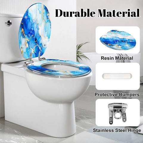 Elongated Alcohol Abstract Indigo White Gold Stains Stains Toilet Seat with blue and gold design, resin material, installed on toilet.