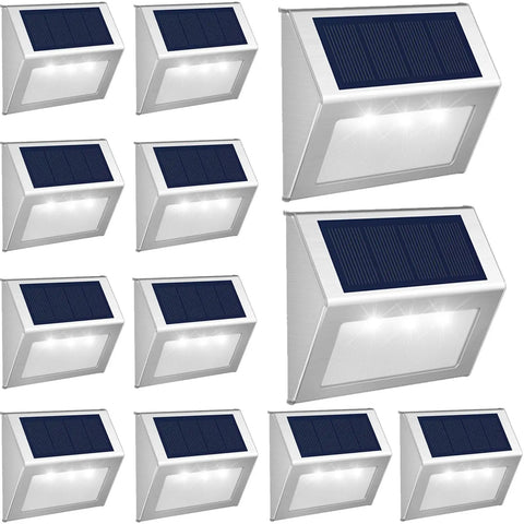 Grid view of 12 solar powered fence lights, stainless steel with cool white LED, for outdoor deck use.