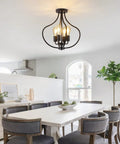 Go-To Four Light Farmhouse Semi Flush Ceiling Light In Black in modern dining room setting with large table