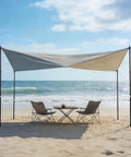 Adjustable Tarp Poles For Camping Set Of 2 Telescoping Tent Poles extend tarp canopy on beach with chairs and table under shade