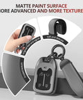Slick Matte TPU Key Fob Cover For Chevy Gmc With Leather Strap Keychain close-up, showing textured matte paint and keychain