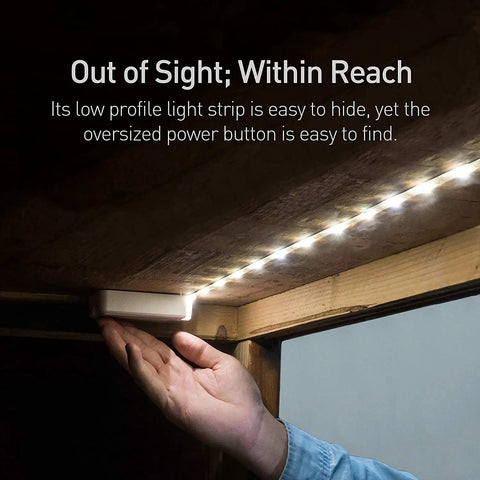 Hand reaching for power button on Luminoodle Under Cabinet Lighting LED Light Strip For Shelves And Kitchen Cabinets Warm White 2700K 3 Pack With Adhesive Tape Easy Install