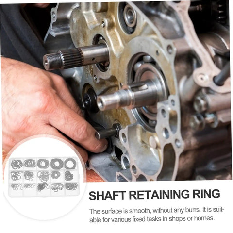 Close-up of auto repair using 175 Piece Steel Snap Ring Kit C Type Retaining Ring Clips Set for Shafts and Bearings.