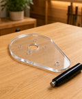 Straight Up Precision Replacement Router Base Plate For Compact Power Tools, 6 By 9 Inch clear acrylic with sub mount on wooden surface.