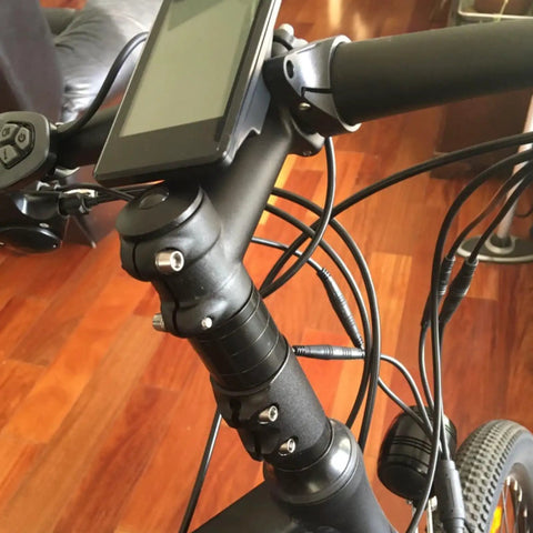 Close-up of bike with fork stem extender and handlebar riser adaptor, aluminum alloy, adjustable height, fits 1 1/8 threadless steerer