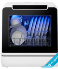 Portable Countertop Dishwasher Unit With Eight Quick Wash Cycles And Whisper Quiet Operation, loaded with plates and glassware.
