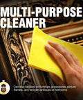 Hand using yellow cloth to apply Antique Restoration Wood Polish And Cleaner Delivers A Top Shelf Formula Loaded With Real Organic Oils For Furniture Care While Knocking Out Grime And Leaves A Hella Smooth Protective Shine On Every Surface on a decorative frame.
