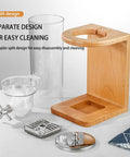 Rock Solid Three Barrel Grain Dispenser For The Kitchen Counter With Smooth Pour Valves And Sturdy Sapelli Wood Base Holds 12 Liters Of Coffee Beans Or Snacks A Total Game Changer For Mess Free Pantry Storage disassembled parts including wooden base and clear containers.