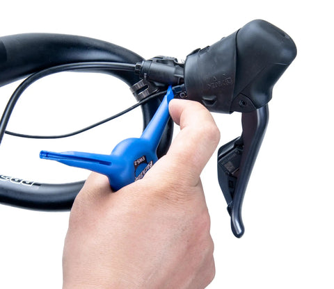 Using EWS-2 Bicycle Electronic Shift Tool For Shimano EW-SD3000 Wires And Batteries to adjust bike gear shifter.