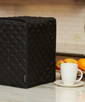 Keepsakes Quilted Coffee Maker Cover With Dust And Stain Resistant, Washable Slip On Design For Countertop Storage in black.
