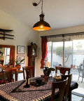 YSGUYILT Vintage Industrial Pendant Lights E26 Retro Metal Hanging Lights, rust-colored 33 cm lamp illuminating a dining room.