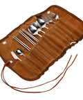 Outdoor Dining Kit Stainless Steel Camping Tableware Set with spoons, forks, and knives in a brown portable pouch