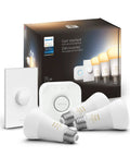 Hue Smart Light Starter Kit With Bridge Smart Button And Three White Ambiance 75W A19 LED Bulbs displayed with packaging