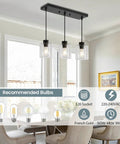 Sleek Black Three Light Pendant Fixtures Hit Different In Modern Kitchen Islands Or Dining Rooms Adjustable Clear Glass Shade Lamps With Killer Style over dining table.