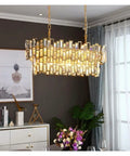Flex Your Dining Room Vibe with K9 Crystal Oval Chandelier Pendant Light Stainless Steel Kitchen Island Lamp Adjustable Chain 50 cm, modern oval design with golden accents.