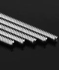 Set Of 4 T8 Leadscrews With Brass Nuts For 3D Printers And CNC Machines, stainless steel threaded rods on black surface