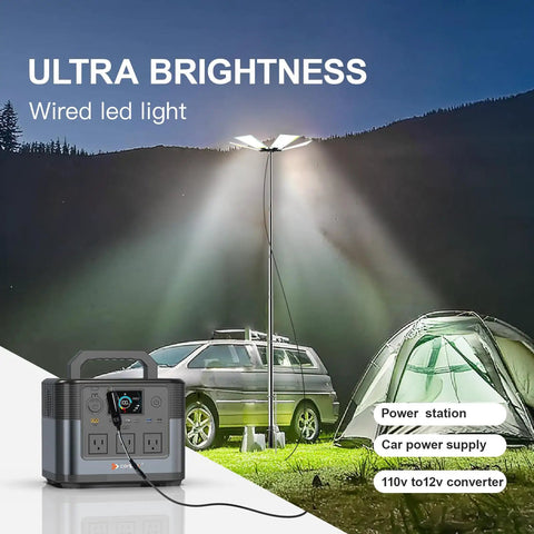 30,000 Lumen Telescoping Camping Light With Remote And Manual Control illuminating campsite with car, tent, and power station.
