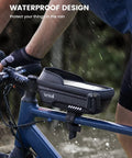 Cyclist using Waterproof Bike Frame Bag With 2 In 1 Phone Mount Top Tube Pouch For Cycling Quick Install Bicycle Phone Holder With Rain Cover Fits Phones Up To 7 Inches Durable Bike Accessory For Road MTB Commuter in rain.