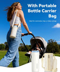 No Mess Hassle On The Fly Breast Milk Cooler with bottle carrier bag and stroller in a park setting. Compact and portable.