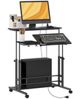 Electric Adjustable Standing Desk, 31 inches, black finish, with monitor, keyboard, and rolling storage feature.