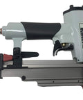 Heavy Duty Pneumatic 23 Gauge Brad Nailer Shoots Straight Through Detail Work With 6000 Piece Headless Pin Kit And Built In Air Duster For No Sweat Fine Crafting side view showing handle and trigger.