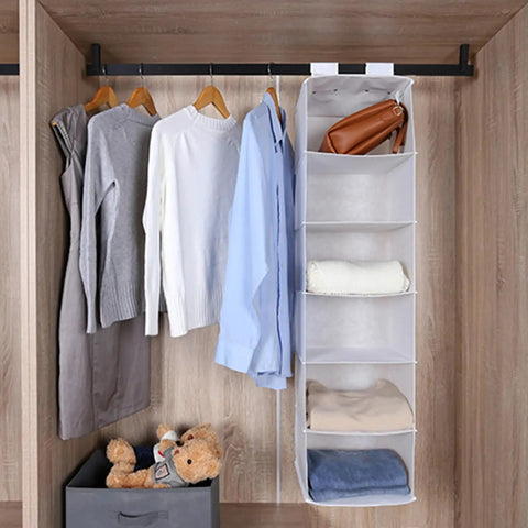 Rock Solid Six Shelf Hanging Closet Organizer With Dividers In Clean White Non Woven Fabric Collapsible Vertical Storage For Clothes And Quilts No Sweat Setup Game Changer with sweaters and shelves.