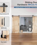 Double Door Sliding Barn Door Hardware Track Kit With Wall Mount And Industrial Spoke Wheel Black Finish, shown installed