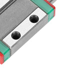 Close-up of a 9mm Miniature Linear Rail with Bearing Steel Block for mini rail systems, featuring ball retainer design and lubrication system.