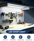 2Ft LED Shop Light Fixture 20W 2400lm 4000K Neutral White installed above workbench in garage setting