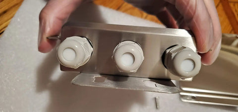 Close-up of Built Tough Stainless Steel Junction Box For 4 Load Cells With IP67 Waterproof Case showing cable ports and enclosure.