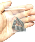 12 Pack 3mm By 30mm Dowel Pins M3 Metal Shelf Pegs For Woodworking And Furniture Stainless Steel 304 Ground To Precision Tolerance 0.0001 To 0.0005 Inch Built Tough For Shelves Bunk Beds And DIY Projects in a person's hand