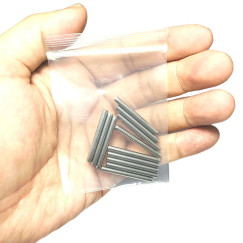 12 Pack 3mm By 30mm Dowel Pins M3 Metal Shelf Pegs For Woodworking And Furniture Stainless Steel 304 Ground To Precision Tolerance 0.0001 To 0.0005 Inch Built Tough For Shelves Bunk Beds And DIY Projects in a person's hand