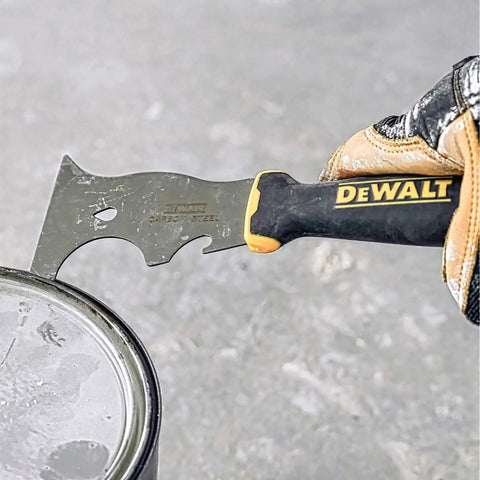 9-In-1 Painter's Tool With Straight And Curved Scrapers, Gouger, Roller Cleaner, Can Opener, Carbon Steel Blade shown opening can