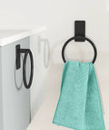 Adhesive Towel Ring For Bathroom No Drilling Install Easy Mount Hand Towel Holder Stainless Steel Aluminum Rustproof Large Base 1.96 By 3.94 Inches Ideal For Home And RV installed on wall with towel.