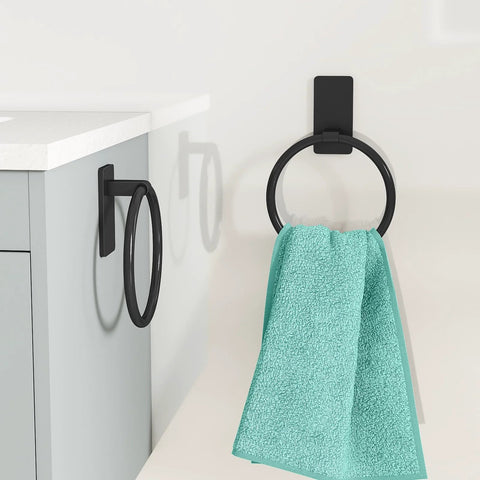 Adhesive Towel Ring For Bathroom No Drilling Install Easy Mount Hand Towel Holder Stainless Steel Aluminum Rustproof Large Base 1.96 By 3.94 Inches Ideal For Home And RV installed on wall with towel.